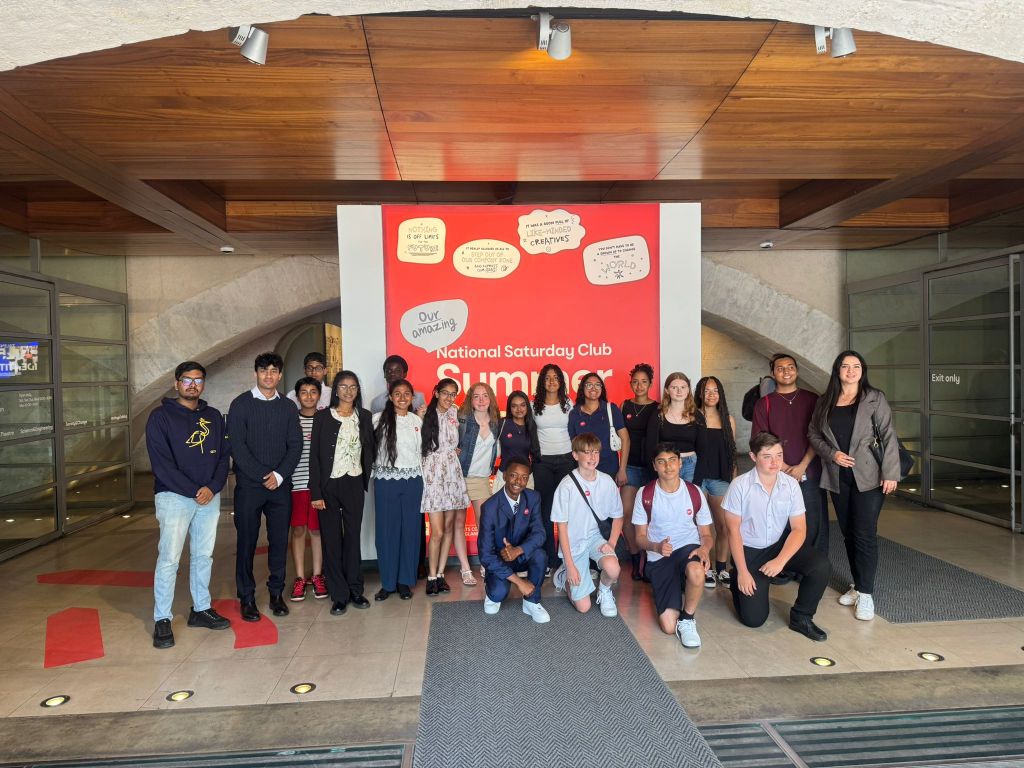 Students outside the entrance to Somerset House, London, where their work is shown as part of a national exhibition