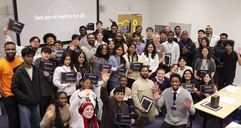 Students and volunteers displaying their certificates at the ARU Hack-a-Ton 2025